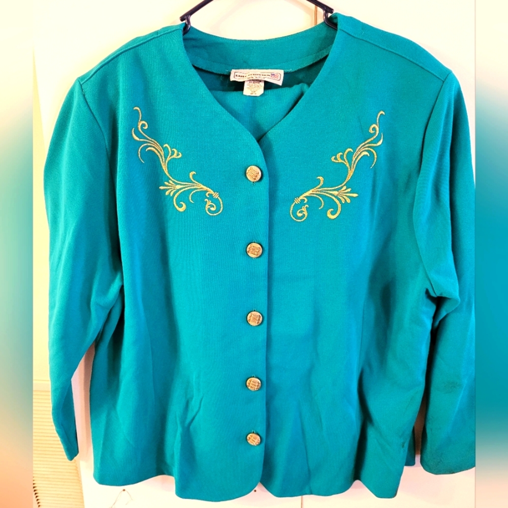 Pablo collection green skirt and jacket set with gold embellishments